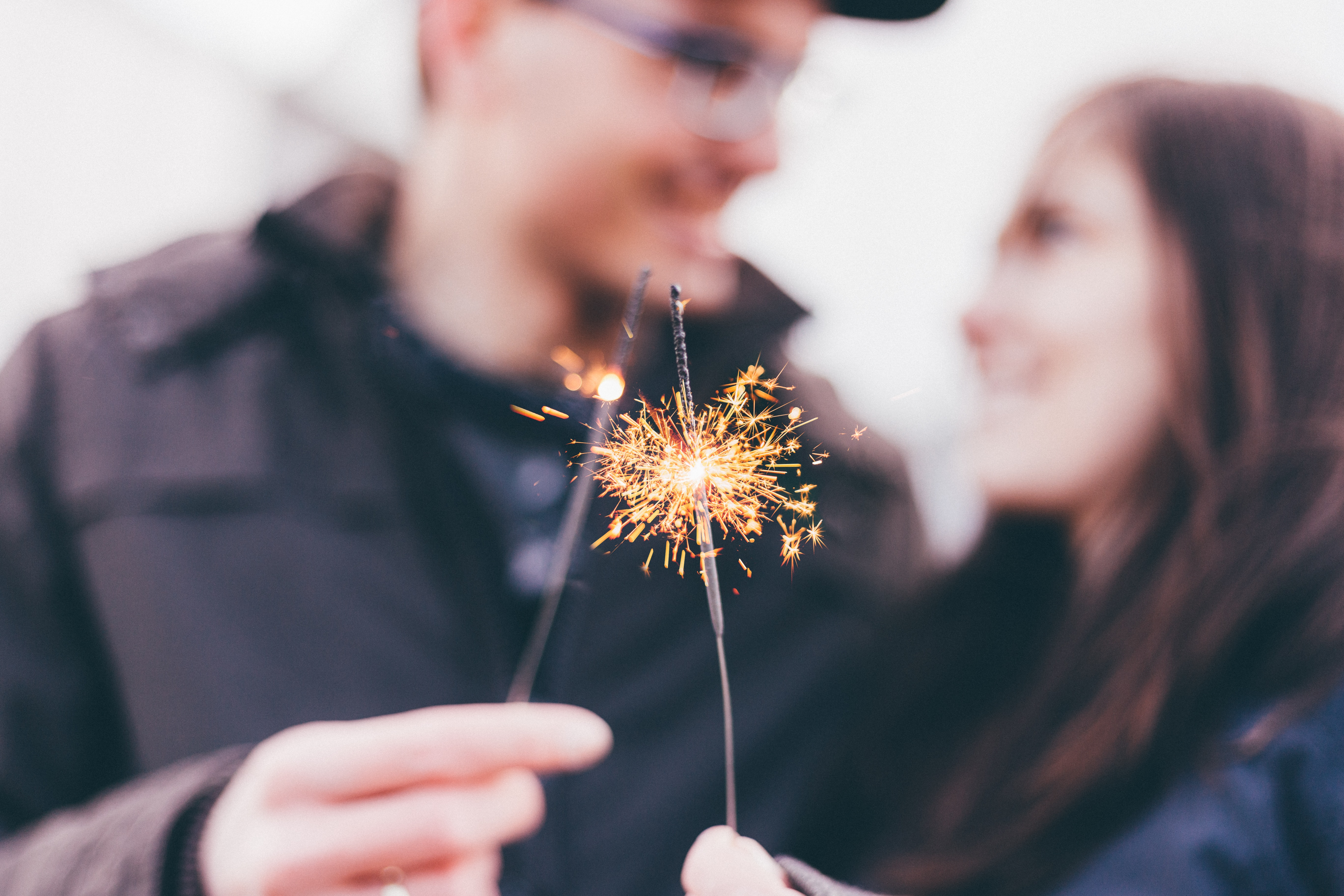 couple holding a sprinkler